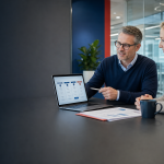 How much do managed IT services cost - business owner reviewing an MSP pricing proposal